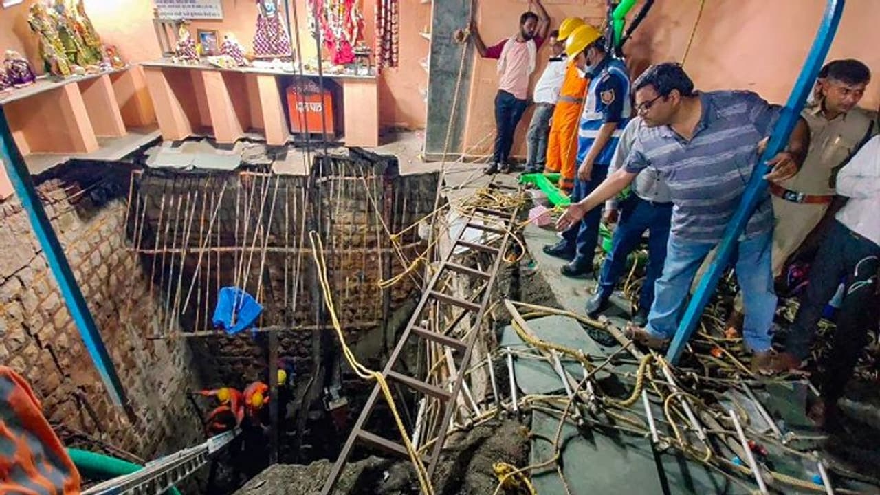 Indore temple stepwell tragedy: Bulldozers roll in as crackdown ordered on illegal structure Indore temple stepwell tragedy: Bulldozers roll in as crackdown ordered on illegal structure