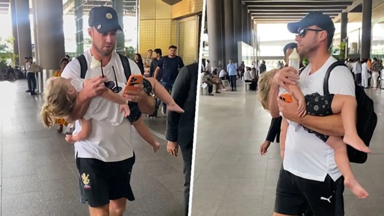 IPL 2023: Day after RCB's win over MI, AB de Villiers spotted doing daddy duty at Mumbai airport WATCH IPL 2023: Day after RCB's win over MI, AB de Villiers spotted doing daddy duty at Mumbai airport WATCH