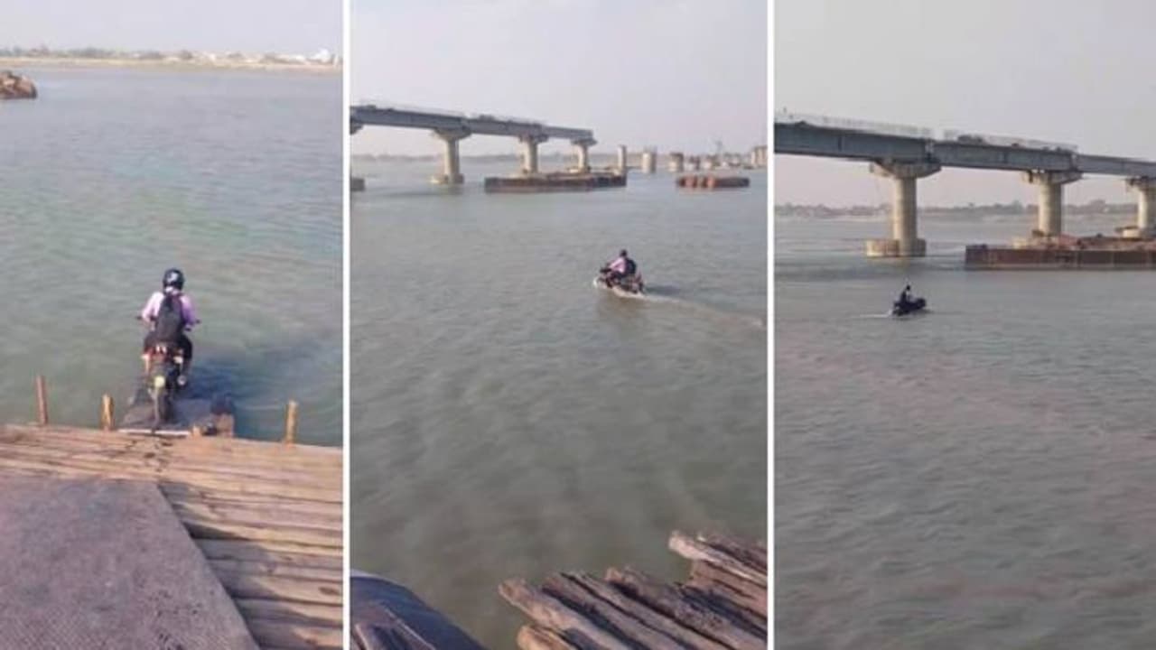 അതിബുദ്ധിയോ, അങ്ങേയറ്റം അപകടകരമോ? പുഴയിലൂടെ ബൈക്ക് ഓടിക്കുന്ന യുവാവ്, വീഡിയോ വൈറൽ 