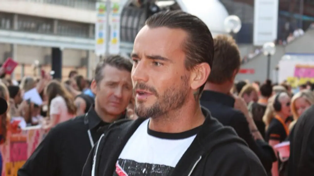 WWE: Watch CM Punk spotted backstage on RAW; real reason for AEW star's arrival revealed WWE: Watch CM Punk spotted backstage on RAW; real reason for AEW star's arrival revealed