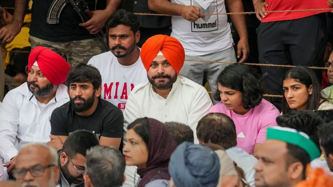 Wrestlers vs WFI chief: 'Motive is to protect the accused'   Sidhu lends support to protesting grapplers