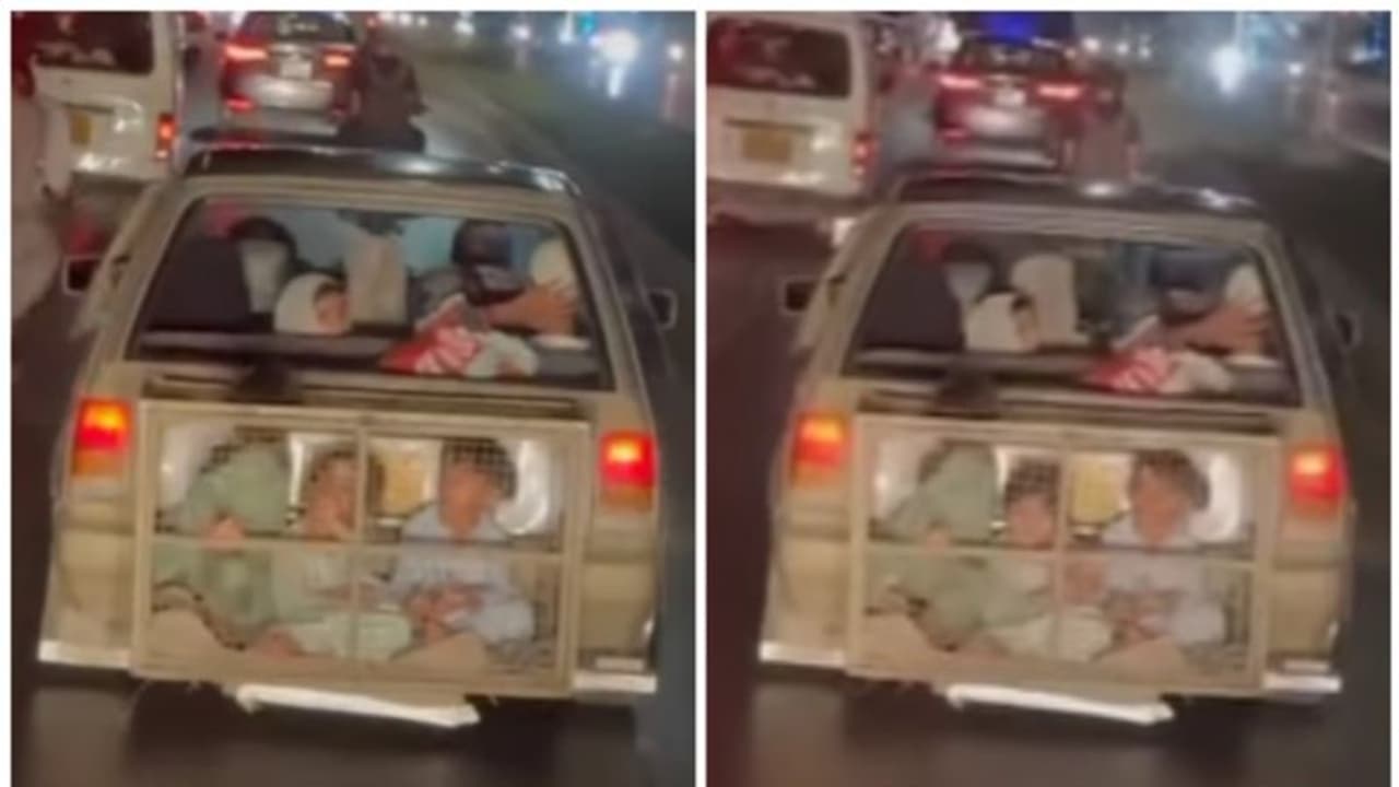 കാറിന് പിന്നില് പ്രത്യേക ഇരുമ്പ് കൂട്ടില് കുട്ടികളുമൊത്തുള്ള യാത്ര; നടപടി ആവശ്യപ്പെട്ട് നെറ്റിസണ്സ് കാറിന് പിന്നില് പ്രത്യേക ഇരുമ്പ് കൂട്ടില് കുട്ടികളുമൊത്തുള്ള യാത്ര; നടപടി ആവശ്യപ്പെട്ട് നെറ്റിസണ്സ്