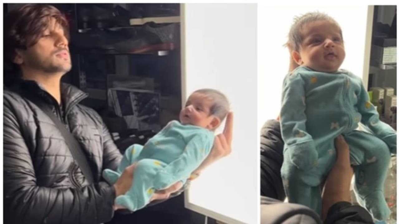 12 ദിവസം പ്രായമുള്ള കുഞ്ഞിന്‍റെ പാസ്പോര്‍ട്ട് ചിത്രമെടുക്കാന്‍ ഒരച്ഛന്‍റെ 'പോരാട്ടം' !