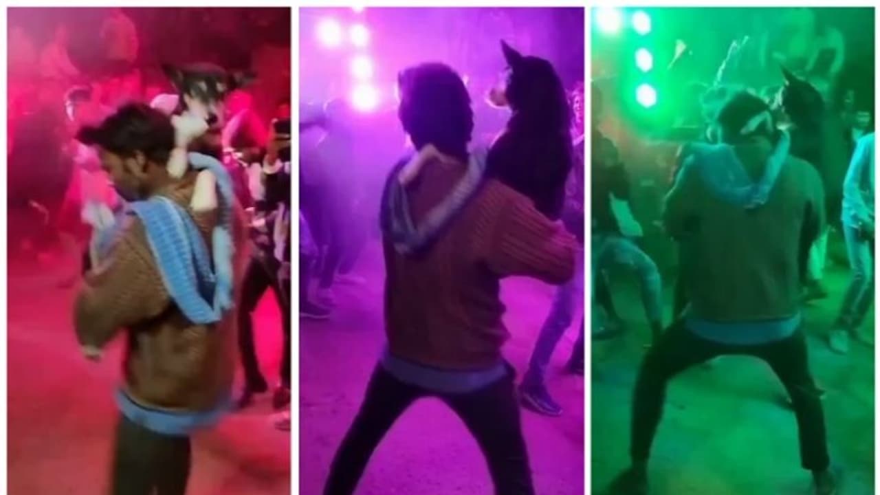 വിവാഹാഘോഷത്തിനിടെ നായയെ കെട്ടിപ്പിടിച്ച് നൃത്തം ചെയ്യുന്നയാളുടെ വീഡിയോ വൈറല് ! വിവാഹാഘോഷത്തിനിടെ നായയെ കെട്ടിപ്പിടിച്ച് നൃത്തം ചെയ്യുന്നയാളുടെ വീഡിയോ വൈറല് !