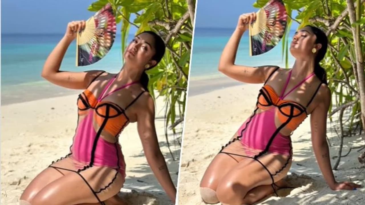 Tridha Choudhury in this orange and pink swimsuit will be treat for your eyes, watch video