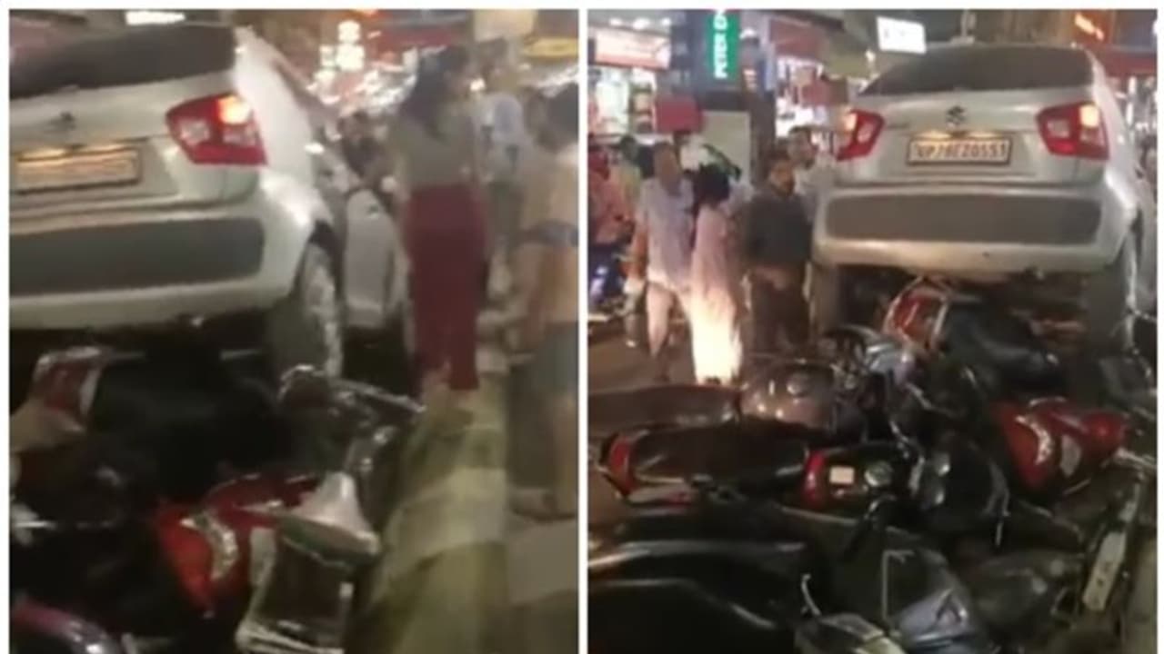 ఆమె డ్రైవింగ్‌కు బైక్‌లన్నీ తుక్కు! పార్క్ చేసిన బైక్‌లపైకి కారు ఎక్కించిన మహిళ!! (Video)