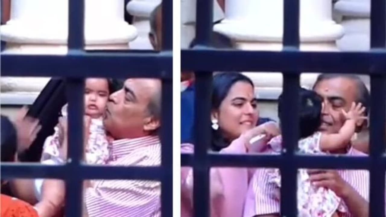 பேத்தியை கையில் ஏந்தி ஆசையாக கொஞ்சும் அம்பானி!! தாத்தாவின் பாசமழையில் நனையும் ஆதியா.. வைரலாகும் வீடியோ..!!