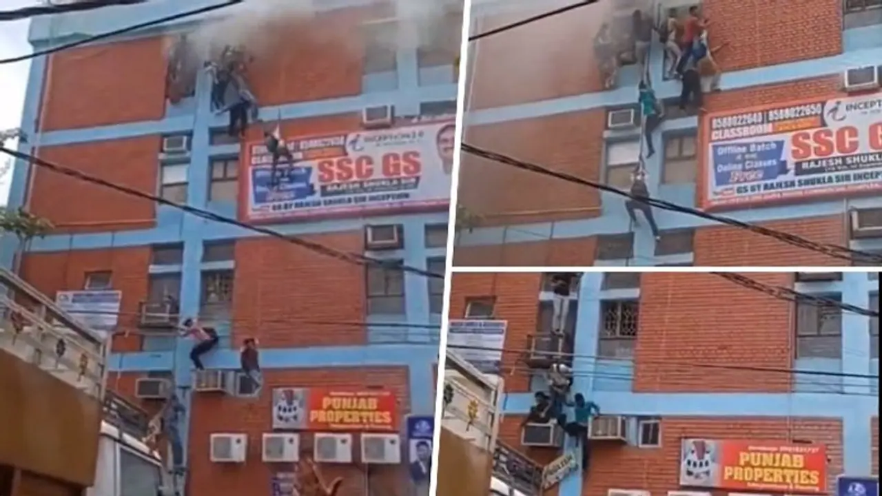 WATCH | Coaching center catches fire in Mukherjee Nagar; students climb down through windows WATCH | Coaching center catches fire in Mukherjee Nagar; students climb down through windows
