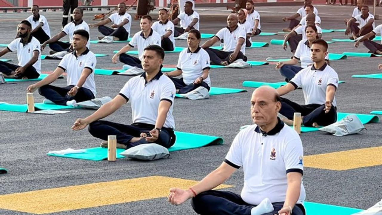 International Yoga Day 2023: Defence Minister Rajnath Singh performs Yoga onboard INS Vikrant (WATCH)