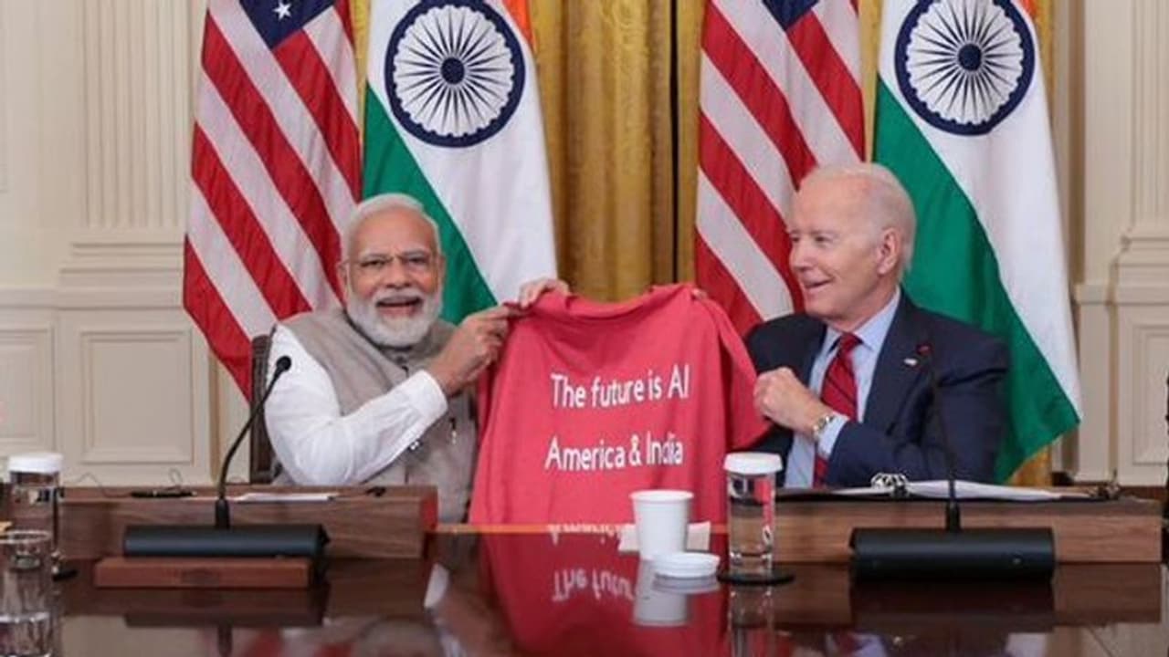 US President Joe Biden gifts special T Shirt to PM Modi with his quote on AI