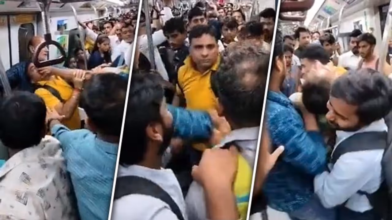WATCH: 2 men get into a fight in Delhi Metro; video goes viral as they hurl abuses at each other WATCH: 2 men get into a fight in Delhi Metro; video goes viral as they hurl abuses at each other