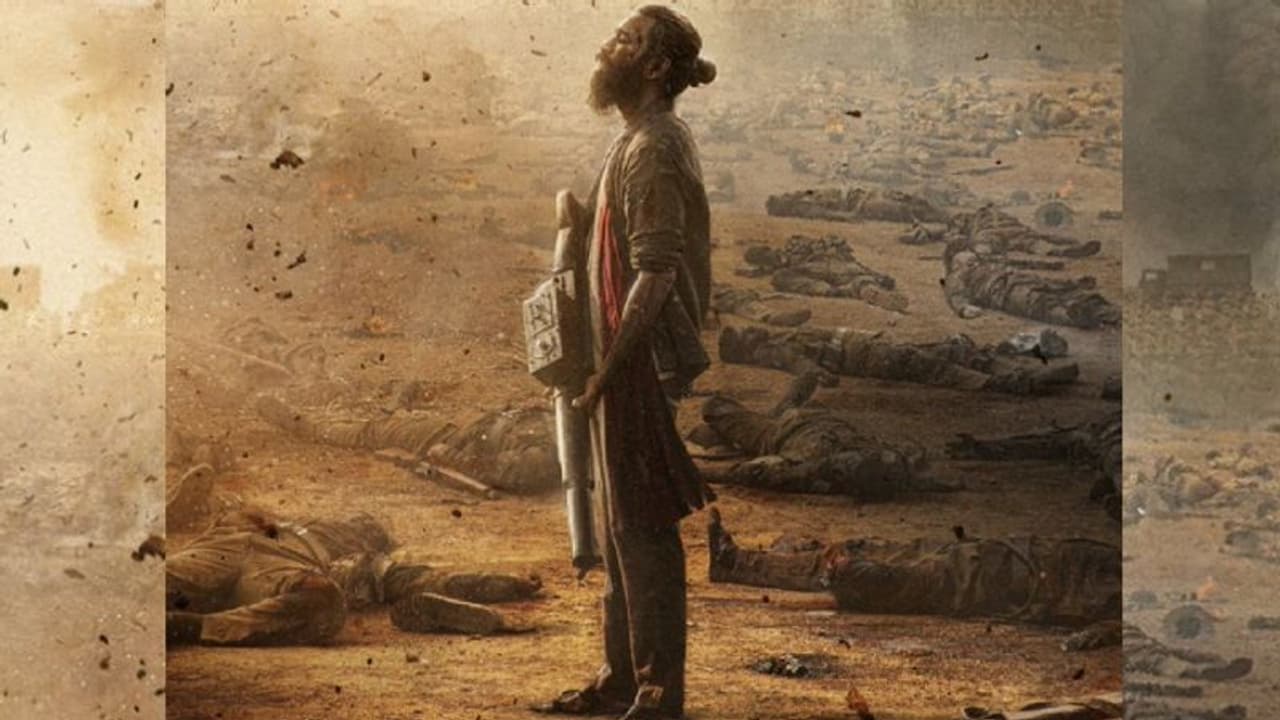 Captain Miller First Look: இறந்து கிடைக்கும் பிணங்களுக்கு நடுவே... மிஷின் கண்ணோடு ஒன்றை ஆளாக மிரட்டும் தனுஷ்!