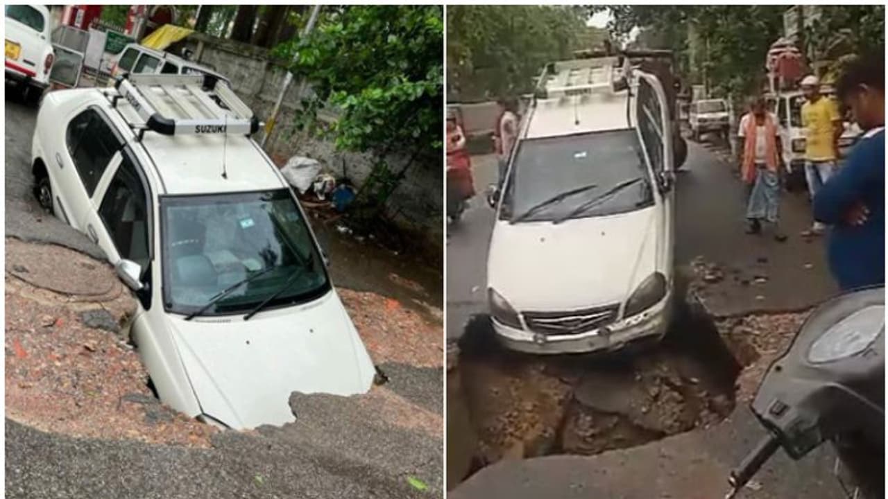 കനത്ത മഴ, പൊടുന്നനെ റോഡിന് നടുവിൽ വമ്പൻ ഗർത്തം; കാറിന്‍റെ പാതിയും കുഴിയിൽ പൂണ്ടു, രക്ഷപ്പെട്ട് ഡ്രൈവർ; വീഡിയോ