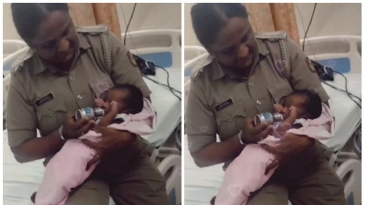 'ഈ കരങ്ങള്‍ സുരക്ഷിതം'; കുഞ്ഞിനെ താലോലിച്ച് വനിത പൊലീസ്, ഹൃദ്യം വീഡിയോ