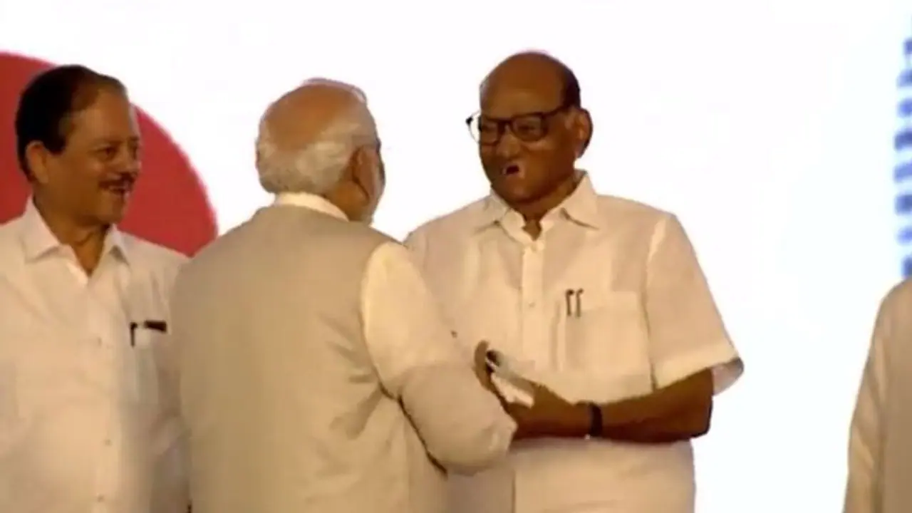 Pawar Modi bonhomie on stage in Pune becomes talk of the town (WATCH)