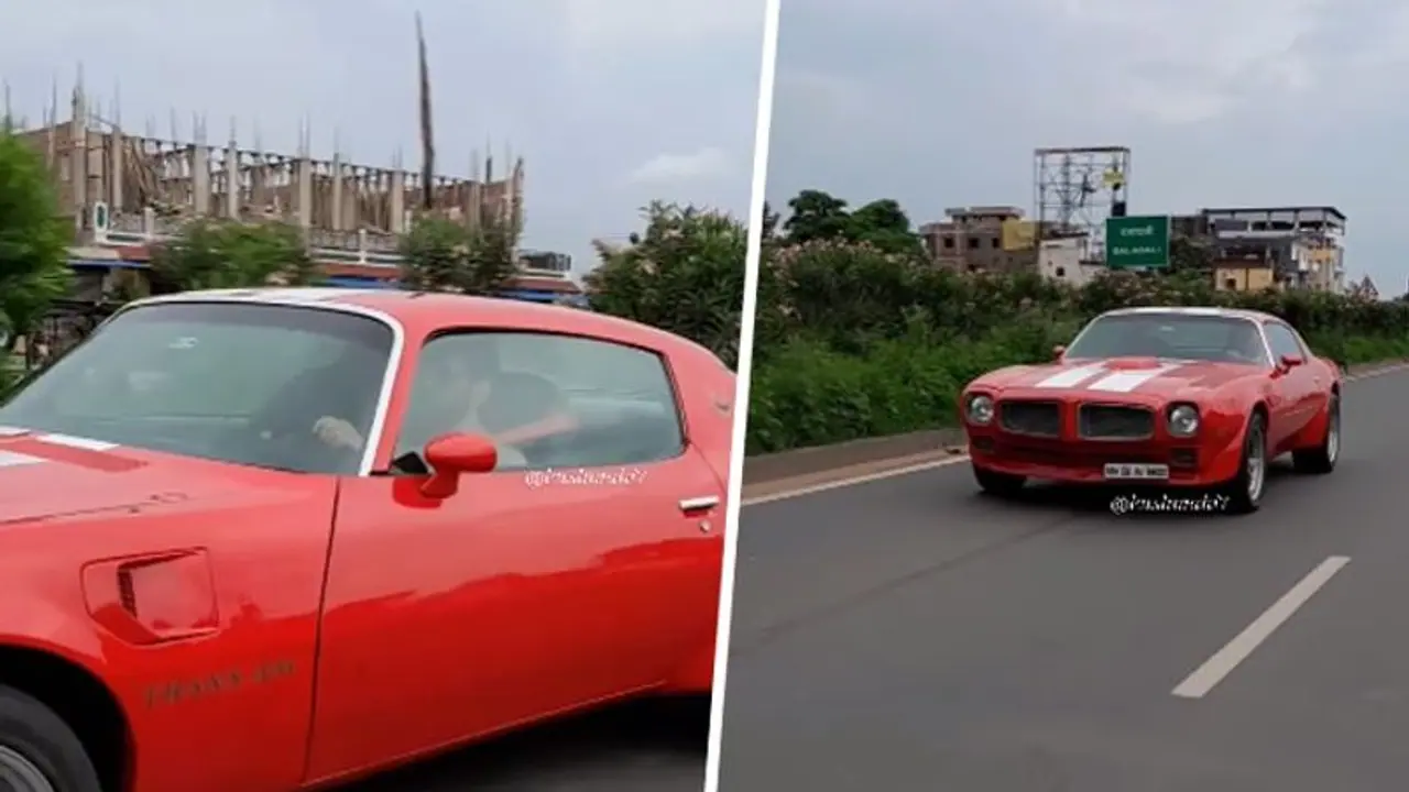 WATCH vintage Mahi: MS Dhoni drives red 1973 Pontiac Trans Am in Ranchi; leaves internet awestruck