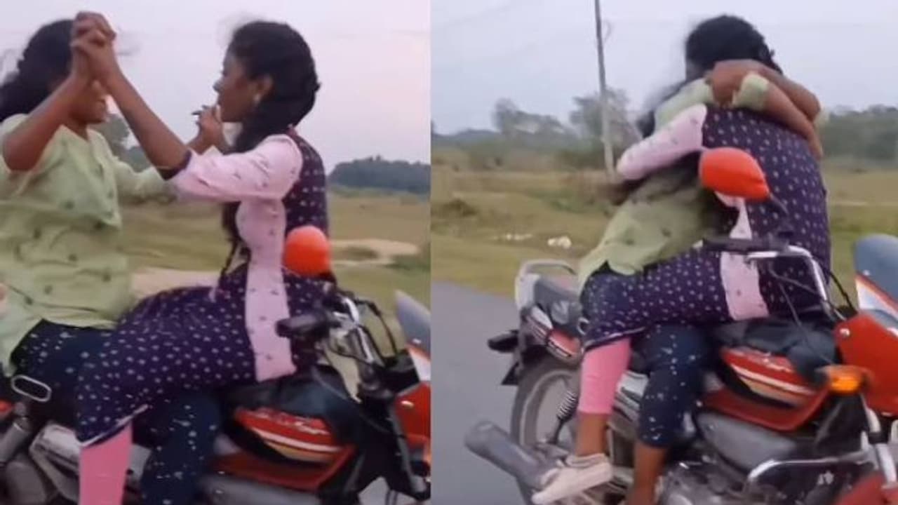 ഓടുന്ന ബൈക്കിൽ കെട്ടിപ്പിടിച്ചും, ഉമ്മവച്ചും സഞ്ചരിക്കുന്ന യുവതികൾ, നടപടി വേണം എന്ന് സോഷ്യൽ മീഡിയ ഓടുന്ന ബൈക്കിൽ കെട്ടിപ്പിടിച്ചും, ഉമ്മവച്ചും സഞ്ചരിക്കുന്ന യുവതികൾ, നടപടി വേണം എന്ന് സോഷ്യൽ മീഡിയ