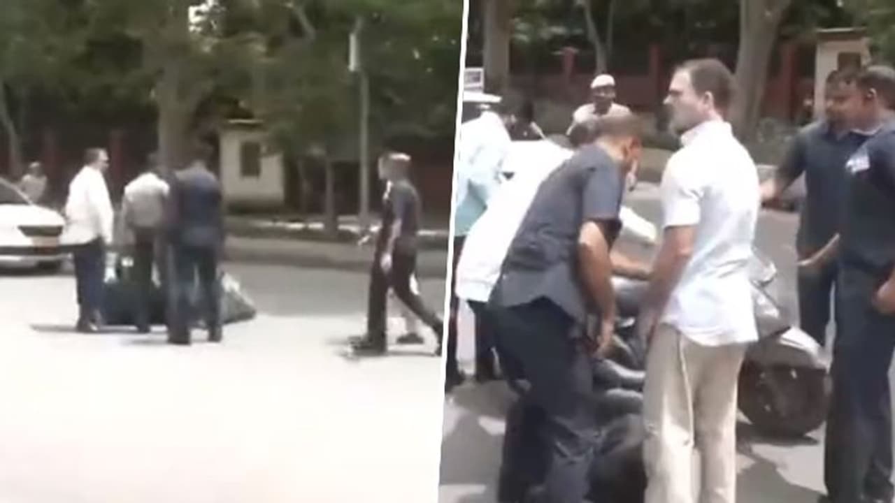Congress leader Rahul Gandhi stops to check man who fell off scooter (WATCH) Congress leader Rahul Gandhi stops to check man who fell off scooter (WATCH)