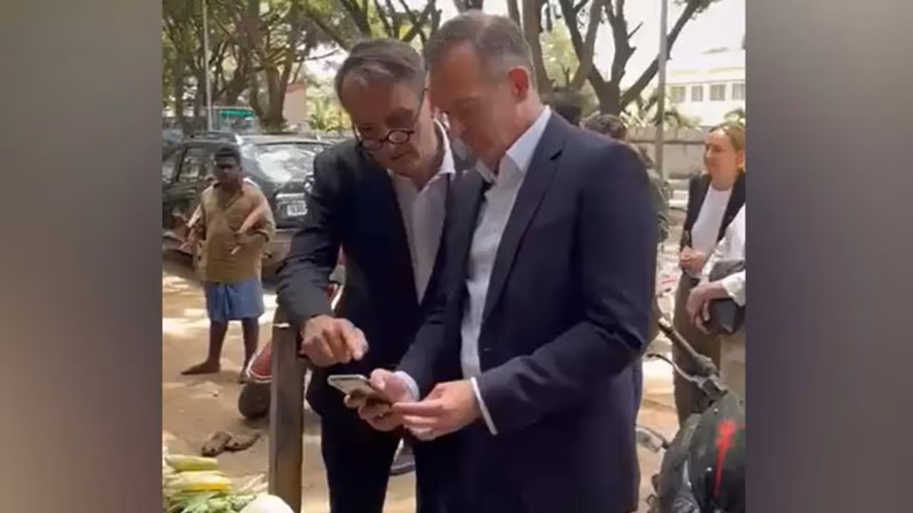 German minister 'fascinated' by India's UPI system after buying veggies from street vendor WATCH German minister 'fascinated' by India's UPI system after buying veggies from street vendor WATCH