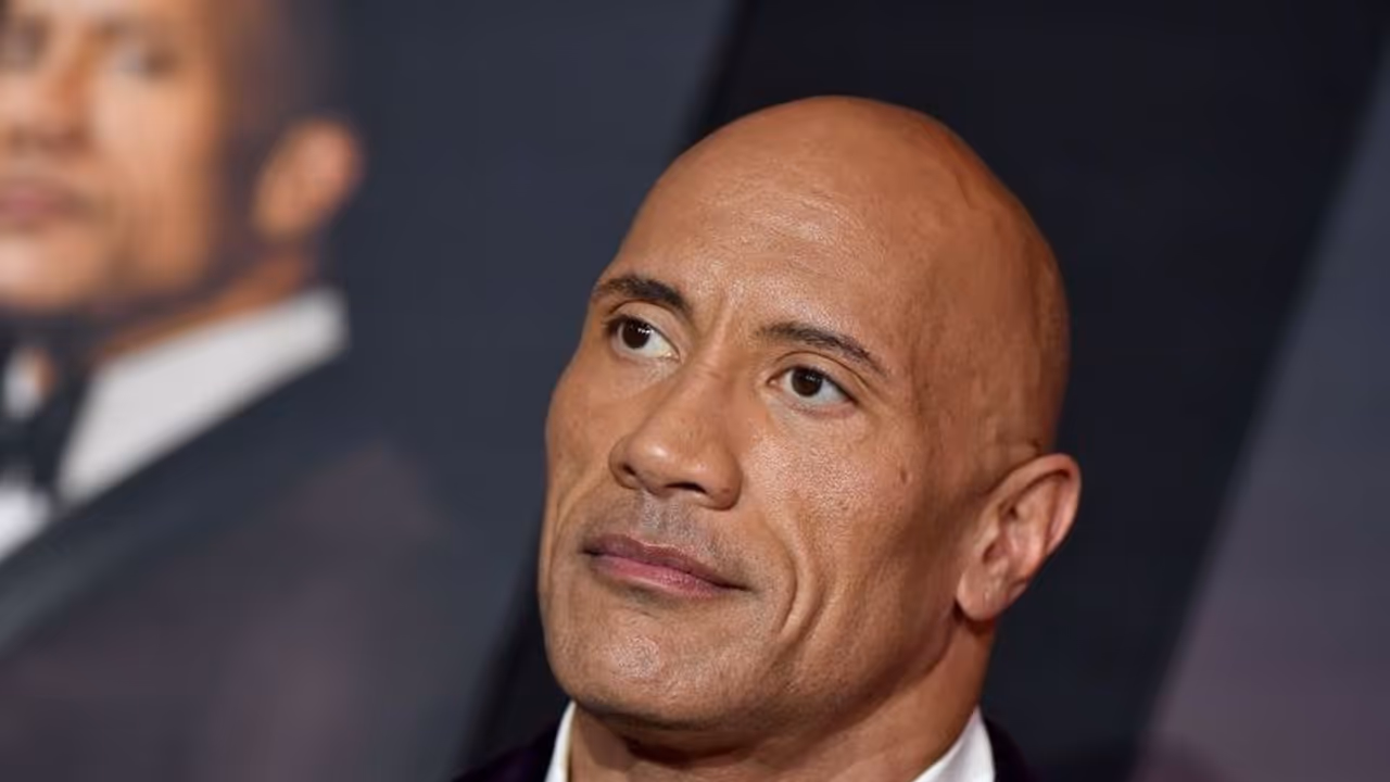 Dwayne Johnson transforms into 'Pink Panther' as daughters playfully paint his face before a zoom meeting