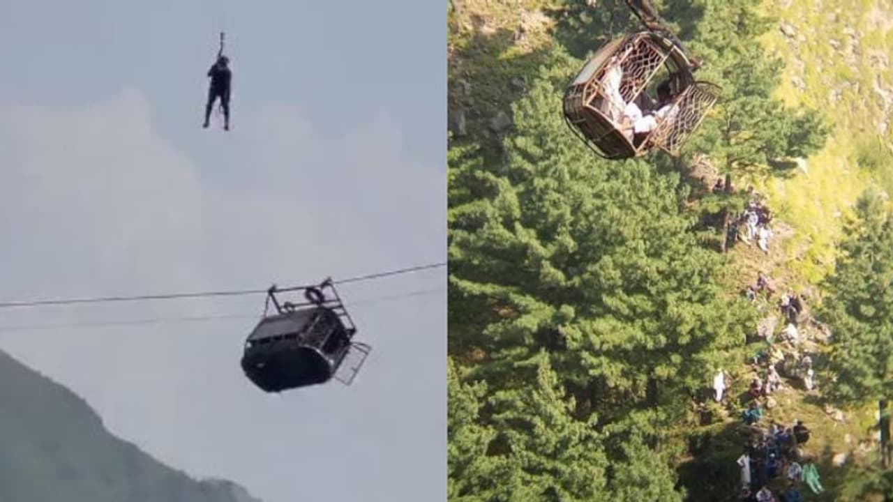 ആശങ്കയ്ക്ക് അറുതി, 900 അടി ഉയരത്തിൽ കേബിൾ കാറിൽ കുടുങ്ങിയ വിദ്യാർത്ഥികളെ രക്ഷിച്ചു, 15 മണിക്കൂർ നീണ്ട ദൗത്യം ആശങ്കയ്ക്ക് അറുതി, 900 അടി ഉയരത്തിൽ കേബിൾ കാറിൽ കുടുങ്ങിയ വിദ്യാർത്ഥികളെ രക്ഷിച്ചു, 15 മണിക്കൂർ നീണ്ട ദൗത്യം