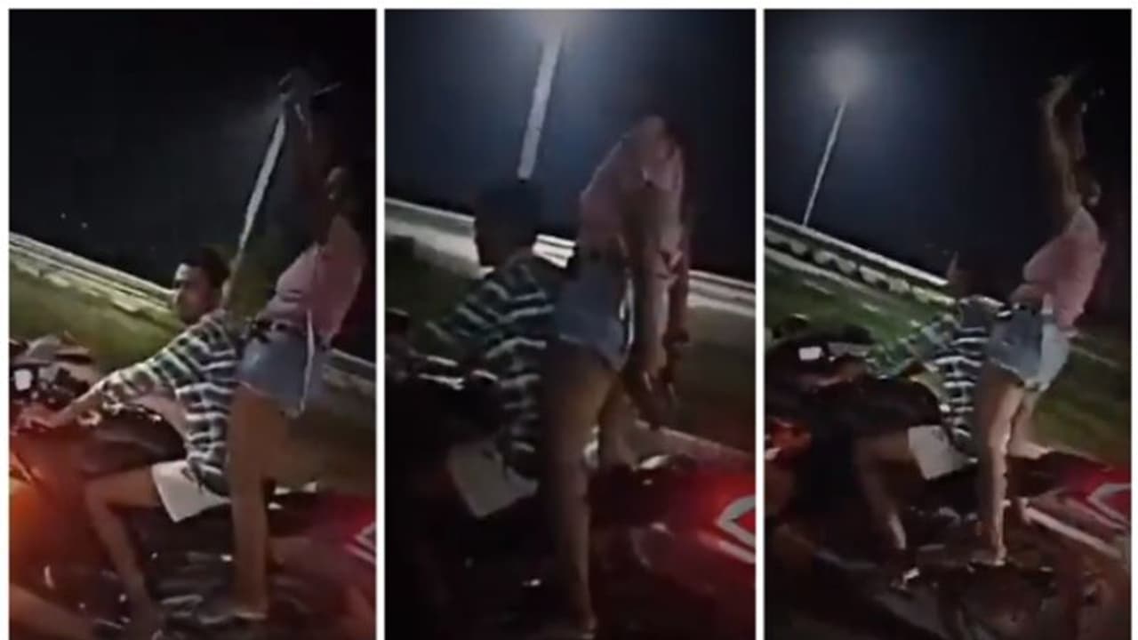 ഇരുകൈയിലും തോക്കുമായി ഓടുന്ന ബൈക്കിന് പുറകില് എഴുന്നേറ്റ് നില്ക്കുന്ന പെണ്കുട്ടിയുടെ വീഡിയോ വൈറല് ! ഇരുകൈയിലും തോക്കുമായി ഓടുന്ന ബൈക്കിന് പുറകില് എഴുന്നേറ്റ് നില്ക്കുന്ന പെണ്കുട്ടിയുടെ വീഡിയോ വൈറല് !