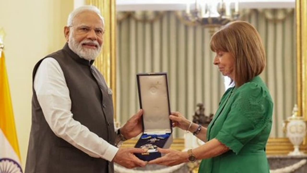 PM Modi conferred with Grand Cross of the Order of Honour by Greek President Katerina N Sakellaropoulou PM Modi conferred with Grand Cross of the Order of Honour by Greek President Katerina N Sakellaropoulou