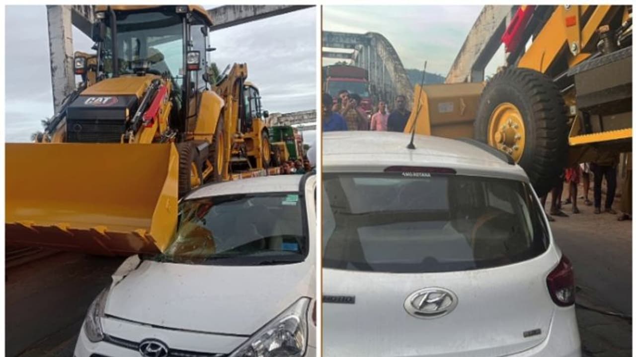 വടകരയിൽ ലോറിയിൽ കൊണ്ടുപോയ ജെസിബി കാറിന് മുകളിൽ തട്ടി അപകടം