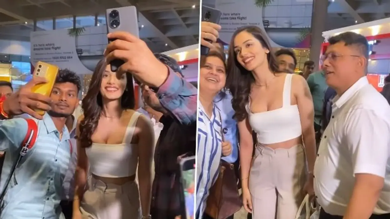 Manushi Chhillar gets mobbed by fans, obliges to their selfie requests; video goes viral! Manushi Chhillar gets mobbed by fans, obliges to their selfie requests; video goes viral!