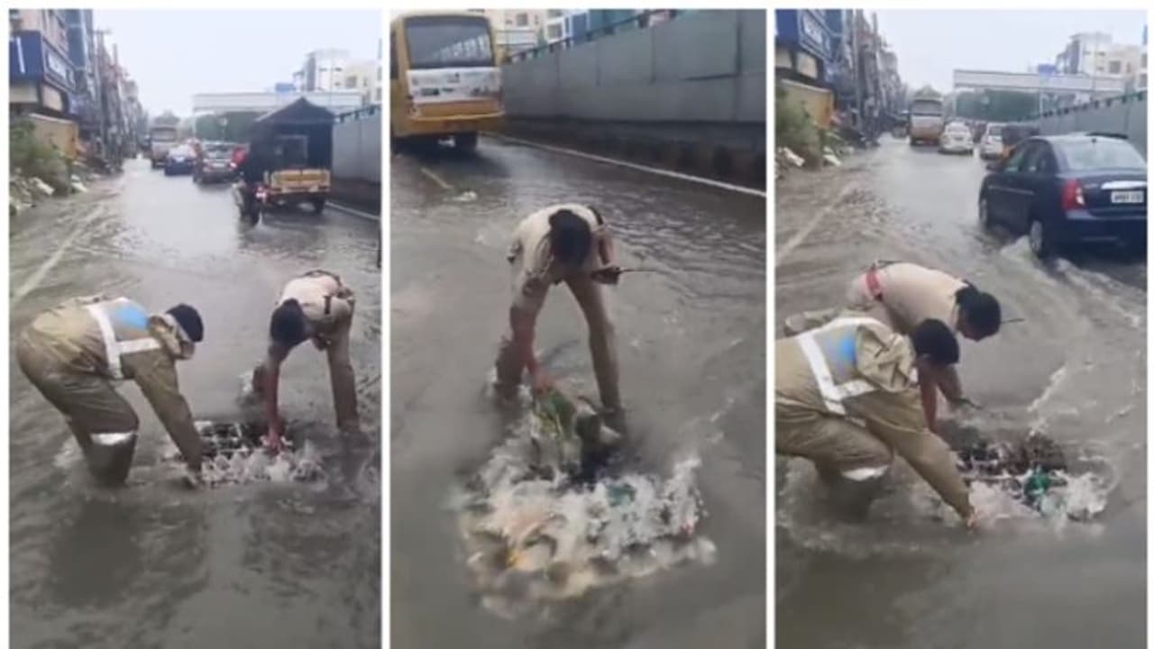 വെള്ളക്കെട്ട് ഇല്ലാതാക്കാൻ ഓവുചാല്‍ കൈകൊണ്ട് വൃത്തിയാക്കി വനിതാ പോലീസ് ഉദ്യോഗസ്ഥ; വീഡിയോ വൈറൽ