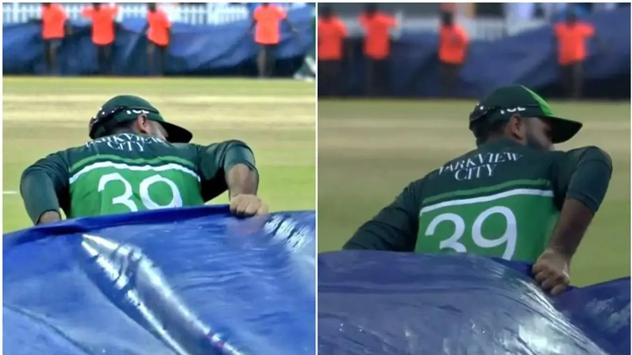 ഒരുമിച്ച് പിടിക്കാം! ഗ്രൗണ്ട് മൂടാന്‍ സ്റ്റാഫുകളെ സഹായിച്ച് പാക് താരം ഫഖര്‍ സമാനും; കയ്യടിച്ച് സോഷ്യല്‍ മീഡിയ