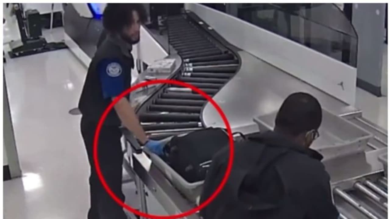 യാത്രക്കാരുടെ ലഗേജില്‍ നിന്നും പണം മോഷ്ടിക്കുന്ന എയർപോർട്ട് സുരക്ഷാ ഉദ്യോഗസ്ഥന്‍റെ സിസിടിവി ദൃശ്യം വൈറല്‍ ! 