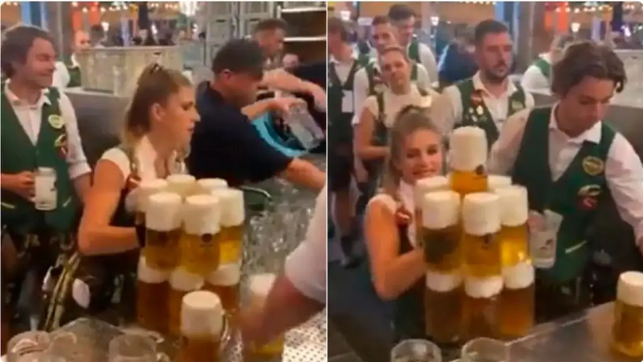 WATCH: Oktoberfest Waitress carries 13 beer mugs at a time; leaves internet impressed WATCH: Oktoberfest Waitress carries 13 beer mugs at a time; leaves internet impressed