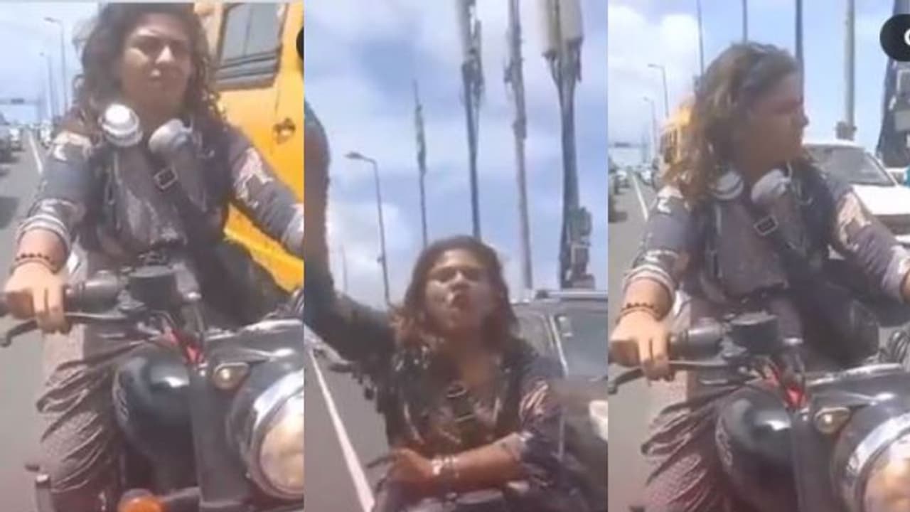 അനുമതിയില്ലാത്തിടത്ത് യുവതി ബൈക്കിലെത്തി, തടഞ്ഞ പൊലീസുകാരോട്, 'പിസ്റ്റൾ' ചൂണ്ടി അസഭ്യം വിഡിയോ