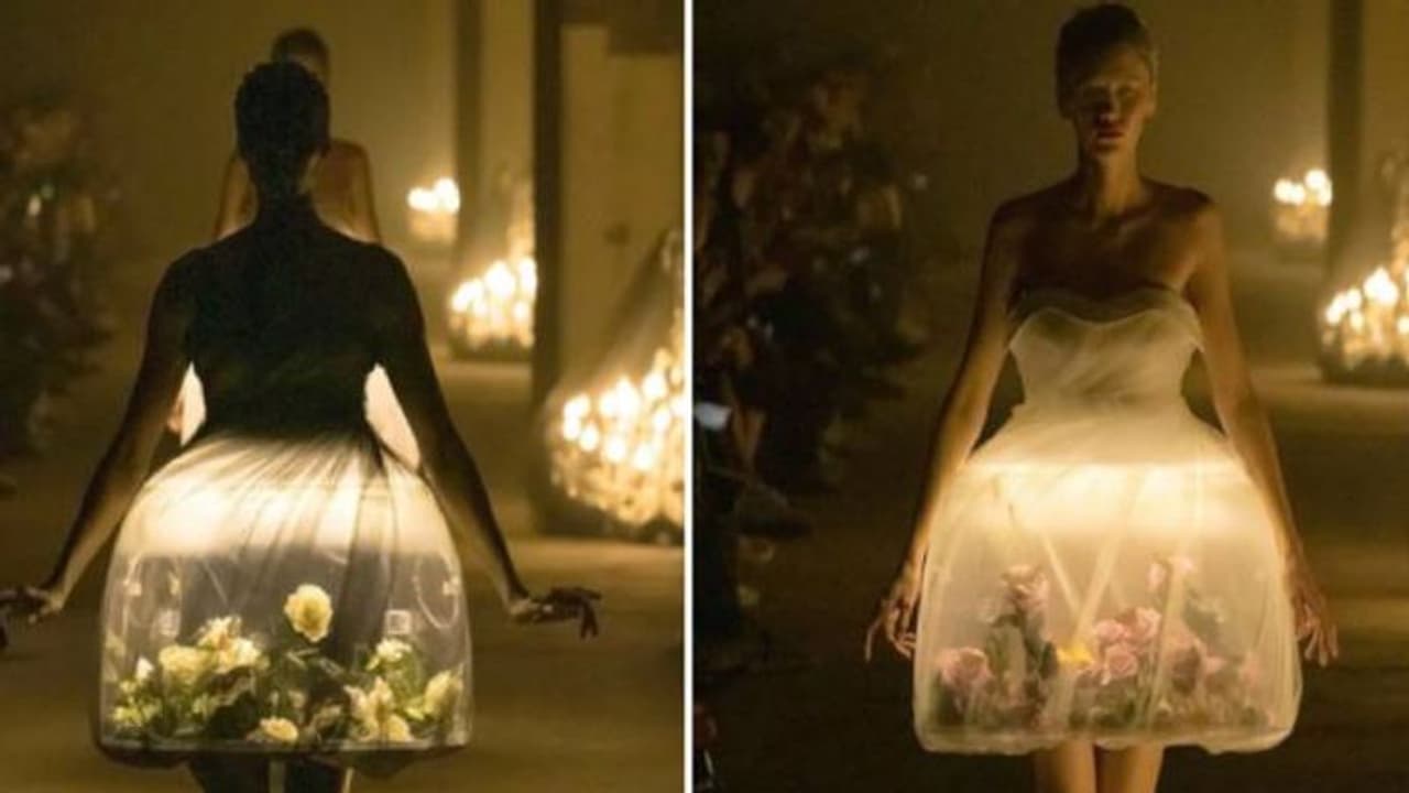 മോഡലിന്റെ വസ്ത്രത്തിനകത്ത് ജീവനുള്ള ചിത്രശലഭം, കൂടാതെ പൂക്കളും ഇലകളും, അഭിനന്ദനവും വിമർശനവുമായി നെറ്റിസൺസ്