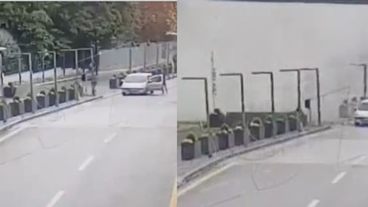 എസ്യുവി കാറിൽ 2 പേർ, ഗേറ്റിലേക്ക് ഇറങ്ങിയോടി, ഒരാൾ പൊട്ടിത്തെറിച്ച് തീഗോളമായി; തുർക്കി ഭീകരാക്രമണ വീഡിയോ എസ്യുവി കാറിൽ 2 പേർ, ഗേറ്റിലേക്ക് ഇറങ്ങിയോടി, ഒരാൾ പൊട്ടിത്തെറിച്ച് തീഗോളമായി; തുർക്കി ഭീകരാക്രമണ വീഡിയോ