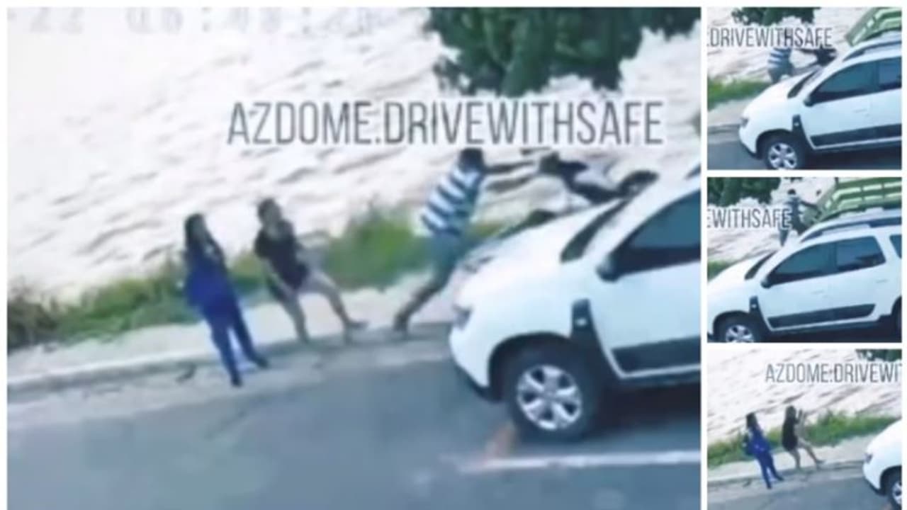 യുവതിയുടെ വീണ് കിടന്ന സ്കൂട്ടർ ഉയര്‍ത്താന്‍ ശ്രമിച്ചയാൾ, സ്കൂട്ടറോടെ വെള്ളം നിറഞ്ഞ പാടത്തേക്ക് !