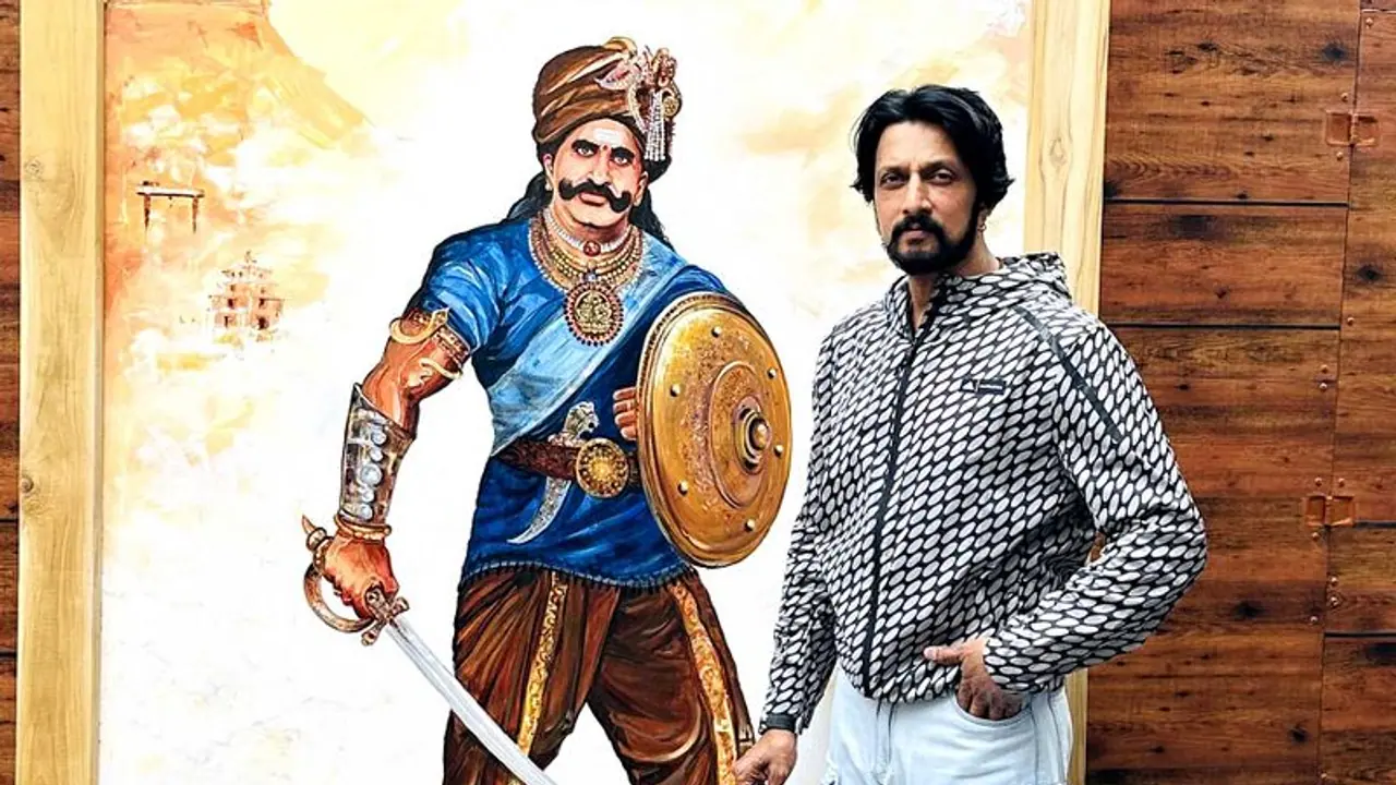 ಹೊಸ ಗೆಟಪ್ನಲ್ಲಿ ರಾಜವೀರ ಮದಕರಿ ನಾಯಕ: ಕಿಚ್ಚ ಸುದೀಪ್ರಿಂದ ಭಾವಚಿತ್ರ ಅನಾವರಣ ಹೊಸ ಗೆಟಪ್ನಲ್ಲಿ ರಾಜವೀರ ಮದಕರಿ ನಾಯಕ: ಕಿಚ್ಚ ಸುದೀಪ್ರಿಂದ ಭಾವಚಿತ್ರ ಅನಾವರಣ