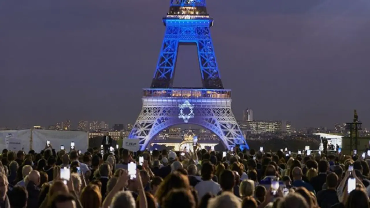 Eiffel Tower in Paris lit up in blue to show France's solidarity with Israel amid Hamas attack | WATCH Eiffel Tower in Paris lit up in blue to show France's solidarity with Israel amid Hamas attack | WATCH