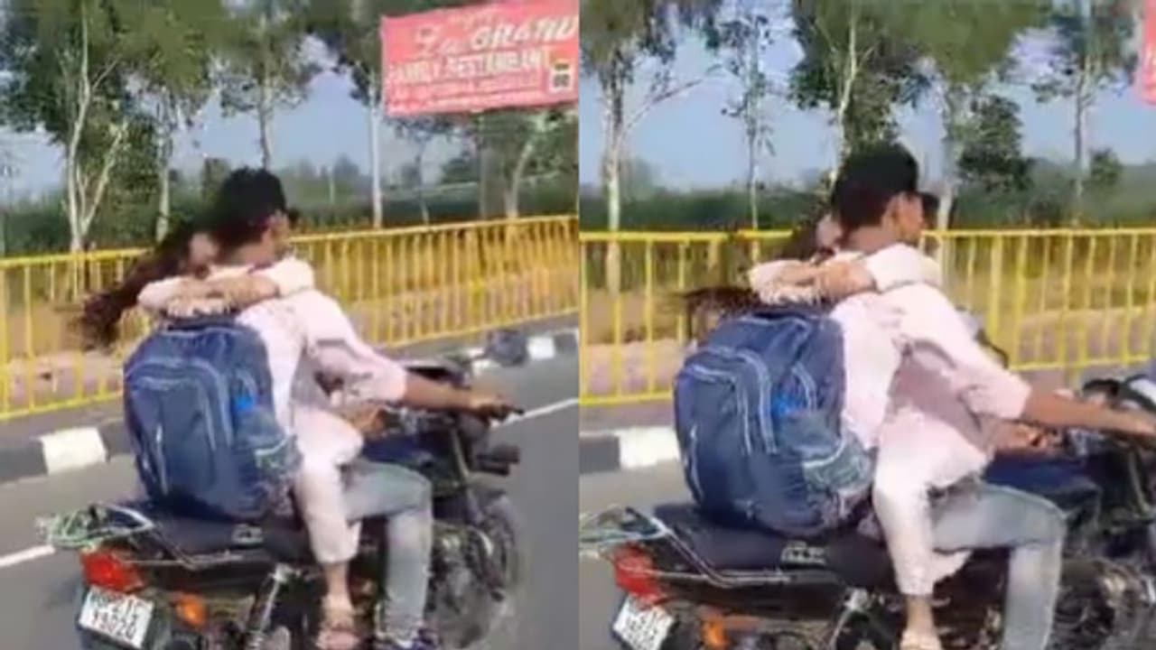ഹെല്‍മറ്റില്ല, ഓടുന്ന ബൈക്കില്‍ മുഖാമുഖമിരുന്ന് കെട്ടിപ്പിടിച്ച് റൊമാന്‍സ്; 8000 പിഴയിട്ട് പൊലീസ്