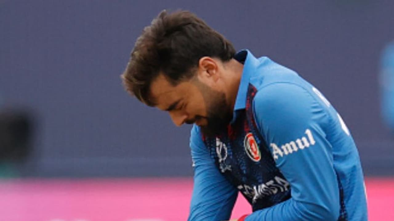 IND vs AFG T20Is: Blow for Afghanistan as star spinner Rashid Khan misses series owing to back injury IND vs AFG T20Is: Blow for Afghanistan as star spinner Rashid Khan misses series owing to back injury