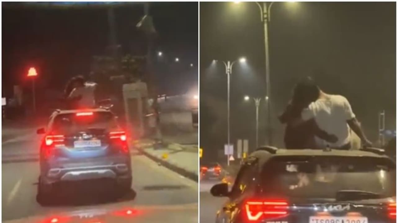 സൺറൂഫില്‍ നിന്ന് ചുംബനവും റൊമാൻസും; വീഡിയോ വൈറലായതോടെ വമ്പൻ ചര്‍ച്ച