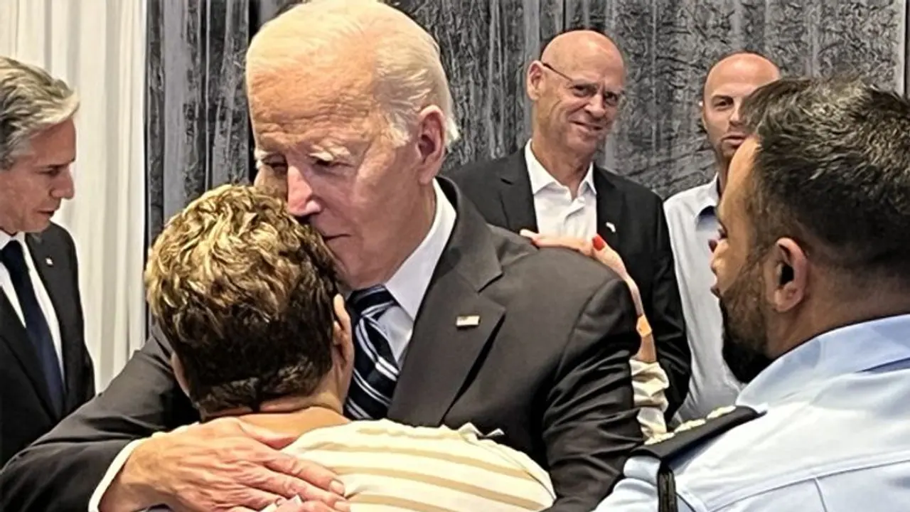Viral photo: Biden hugs Israeli woman who tricked Hamas operatives with cookies, coffee Viral photo: Biden hugs Israeli woman who tricked Hamas operatives with cookies, coffee