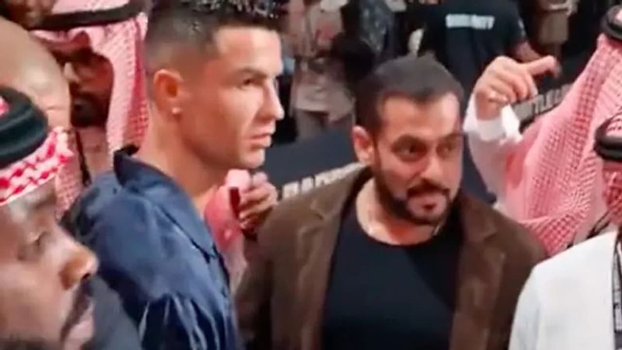Unprecedented crossover: Cristiano Ronaldo walks past Salman Khan at a boxing event in Saudi Arabia (WATCH)