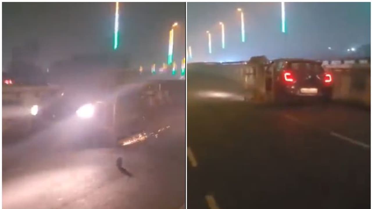 നിലത്ത് ഉരഞ്ഞ് തീപ്പൊരി ഉയര്‍ന്നു, ഫ്ലൈ ഓവറിൽ കൂടി പായുന്ന സ്വിഫ്റ്റ് കാർ; ഒപ്പം കൂടിയതെന്താ? വീഡിയോ