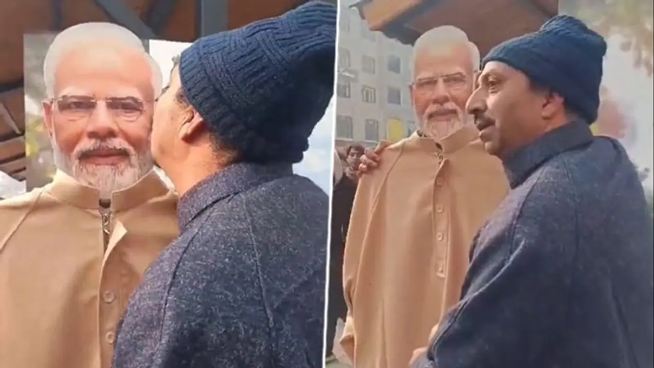 Social media abuzz as Kashmiri man admires, kisses PM Modi's cutout in viral video (WATCH) Social media abuzz as Kashmiri man admires, kisses PM Modi's cutout in viral video (WATCH)
