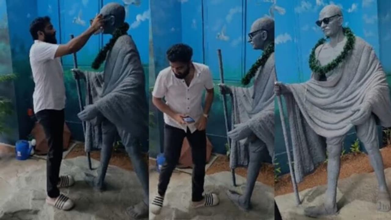 ಗಾಂಧಿ ಪ್ರತಿಮೆಗೆ ಕೂಲಿಂಗ್‌ ಗ್ಲಾಸ್‌ ಹಾಕಿ ಅವಮಾನಿಸಿದ ಎಸ್‌ಎಫ್‌ಐ ನಾಯಕ!