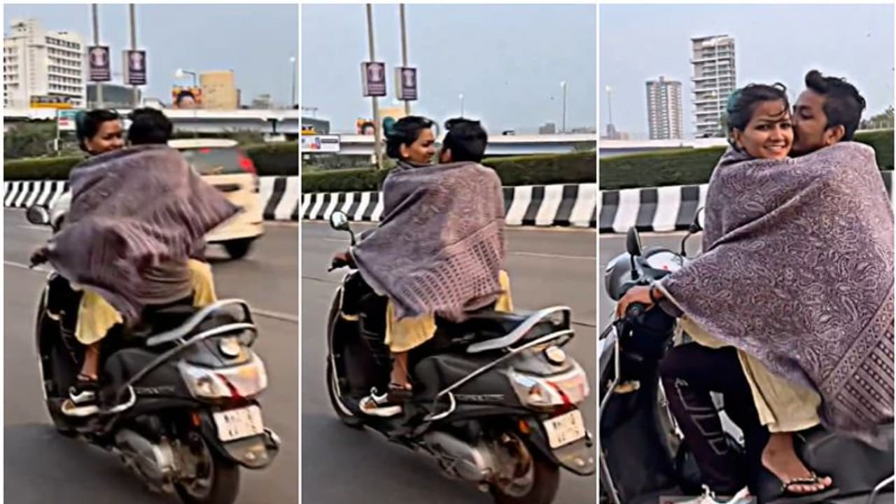 'സ്കൂട്ടറില് സഞ്ചരിക്കുന്നതിനിടെ ചുംബനം': നടപടി വേണമെന്ന് എംവിഡിയോട് സോഷ്യൽമീഡിയ, വീഡിയോ 'സ്കൂട്ടറില് സഞ്ചരിക്കുന്നതിനിടെ ചുംബനം': നടപടി വേണമെന്ന് എംവിഡിയോട് സോഷ്യൽമീഡിയ, വീഡിയോ