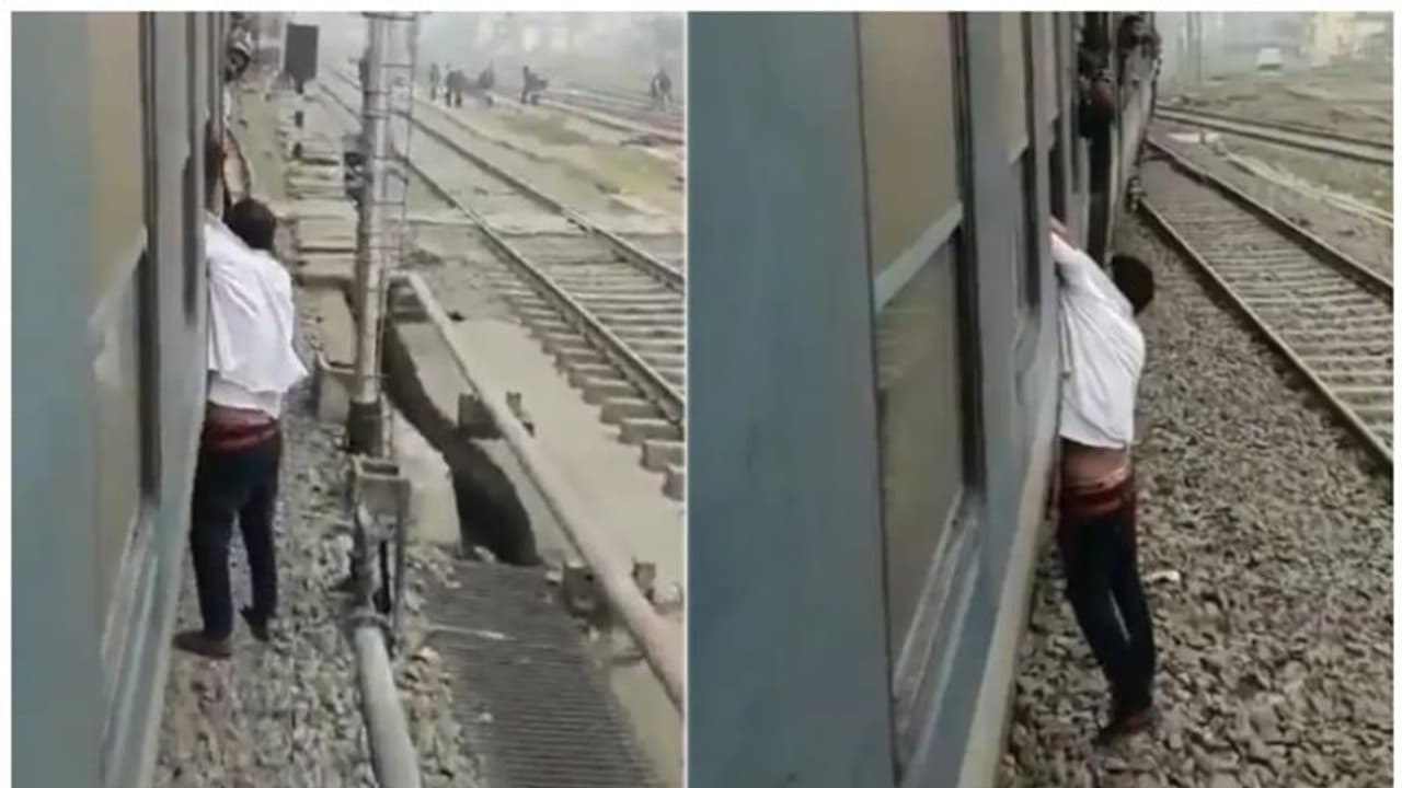 ഓടുന്ന ട്രെയിന്റെ ജനലിലൂടെ ഫോൺ തട്ടാൻ ശ്രമം; കൈ പിടിച്ചുവെച്ചതോടെ കുടുങ്ങിയ കള്ളന് ട്രെയിനിൽ തൂങ്ങി യാത്ര ഓടുന്ന ട്രെയിന്റെ ജനലിലൂടെ ഫോൺ തട്ടാൻ ശ്രമം; കൈ പിടിച്ചുവെച്ചതോടെ കുടുങ്ങിയ കള്ളന് ട്രെയിനിൽ തൂങ്ങി യാത്ര