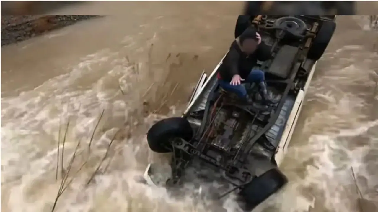 Dramatic rescue: California woman survives 15 hours stranded on top of overturned car in floodwaters (WATCH)
